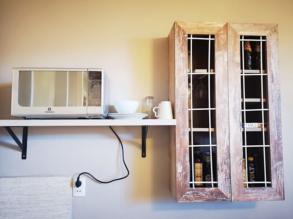 Apartment, Multiple Beds, Garden View | Private kitchenette | Fridge, microwave, coffee/tea maker, cookware/dishes/utensils
