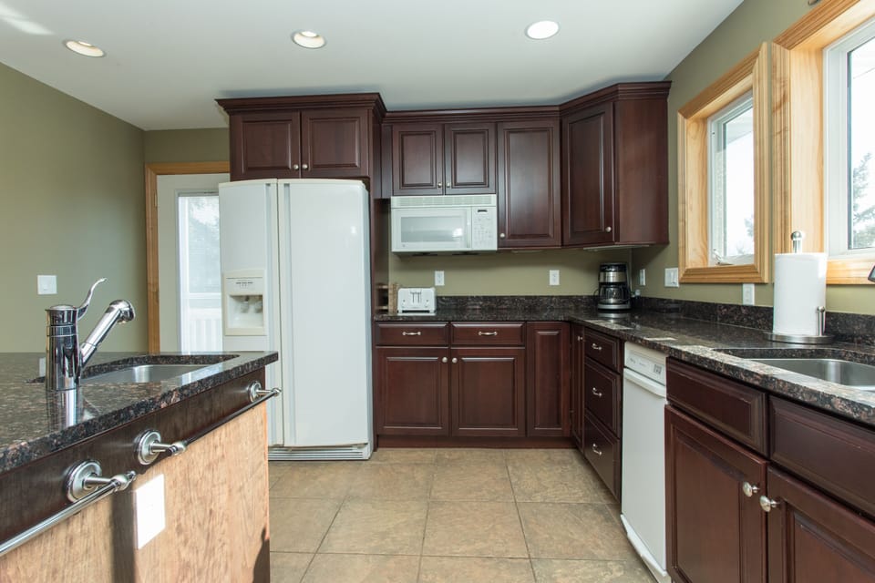 Kitchen (Fridges in Kitchen, Garage and Lower Level)
