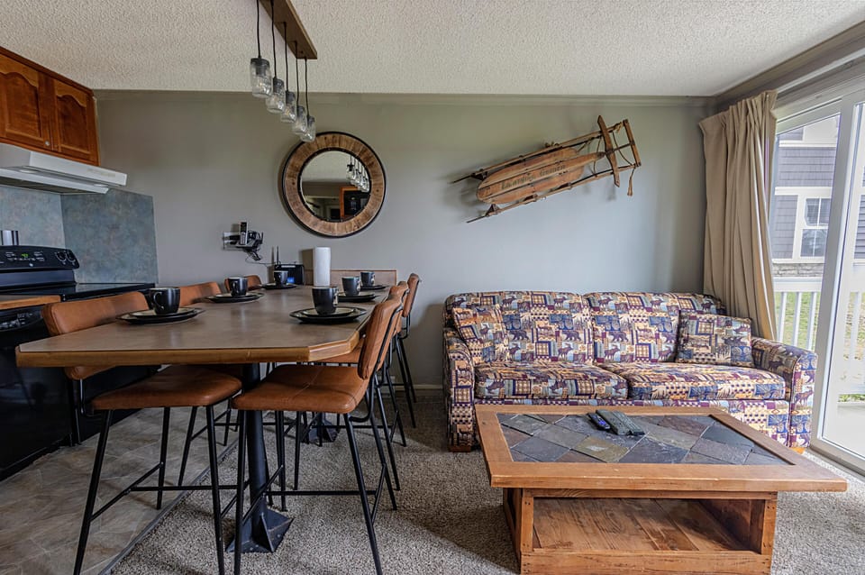 Gather around for meals around the roomy kitchen island for six people.