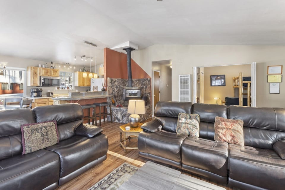 Plenty of space to relax and enjoy the crackling fire of the wood stove