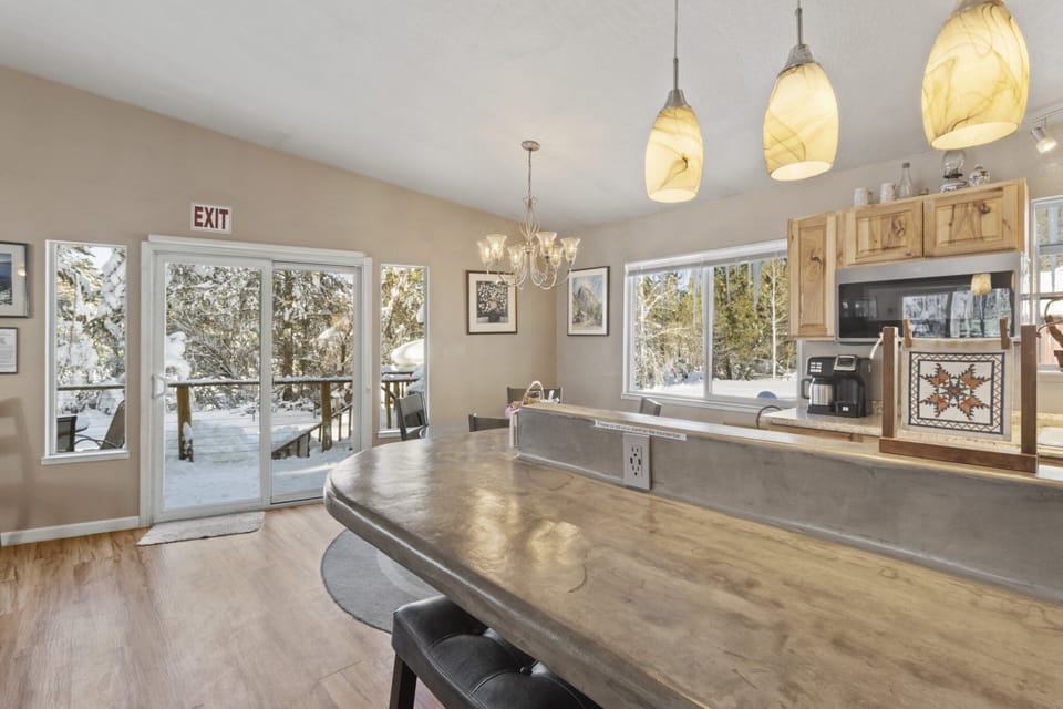 Counter dining and seating adds to the light bright open floor plan