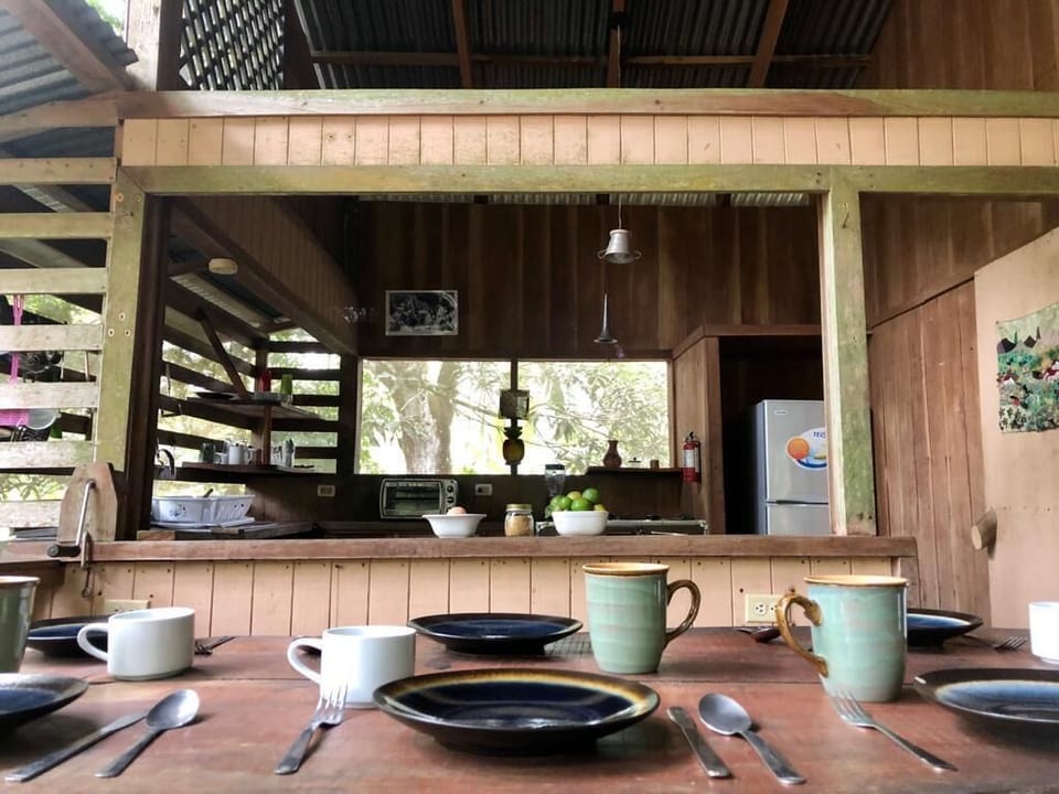 Kitchen and dining area open to one another for conversational mealtimes.