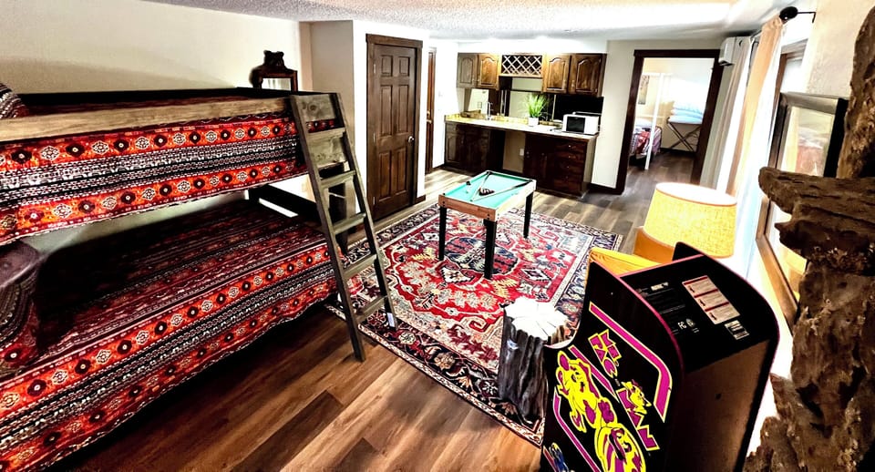 Bunk Room with Ms Pac-Man arcade and pool bunk room with arcade &!pool table