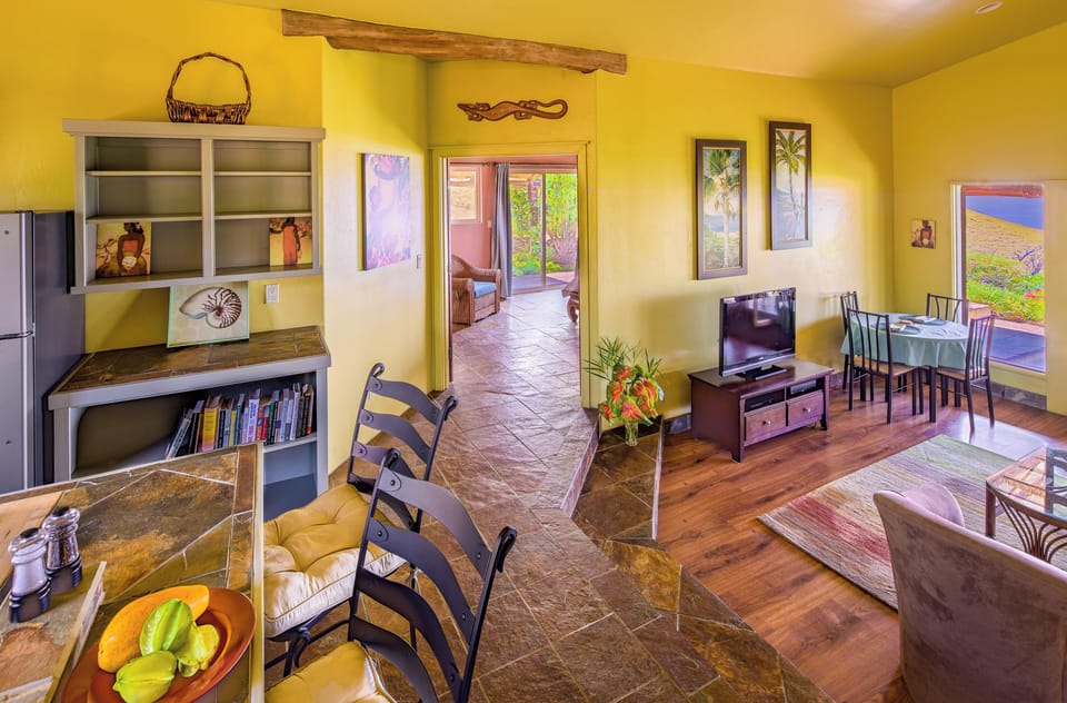 Sunken living room and entry way to master suite from kitchen