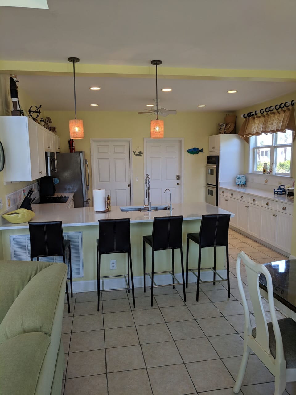 Cooks love our bright, well-equipped kitchen w/  Quartz counters & extra seating