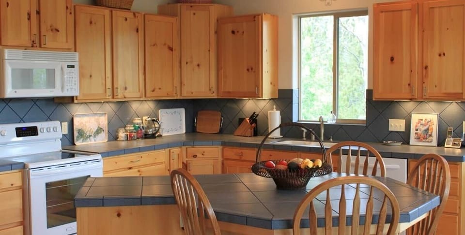 Our full kitchen has a side-by-side fridge/freezer combo, a dish washer, microwave, stove and oven. We provide plates, cups, mugs, silverware, (all the basic necessities) and much more. 
