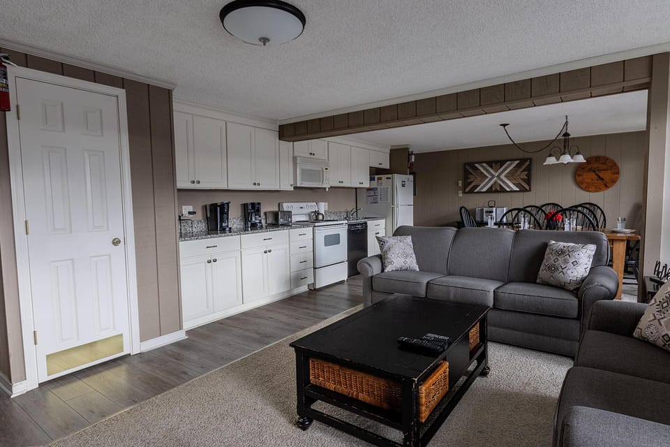 The spacious living room is great for relaxing and has one queen sofa bed.
