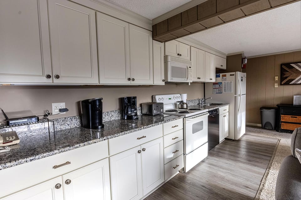 The sprawling kitchen has 126" of granite counterspace!