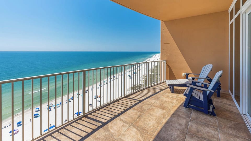 Relax on the balcony, soaking in breathtaking views of the coastline and enjoying the gentle gulf breeze