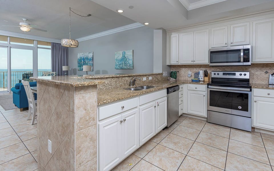 Experience culinary delights as you prepare meals in the spacious kitchen, blending style with functionality