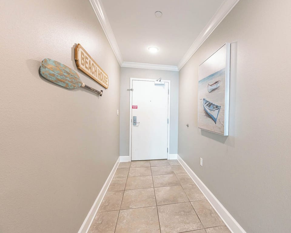 Step inside your vacation retreat, greeted by charming decor and a warm, inviting vibe to start your beach getaway