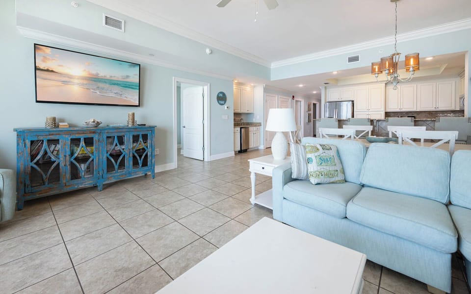 Unwind in this inviting family room after a day at the beach on the sofa with a queen sleeper and enjoy a good movie