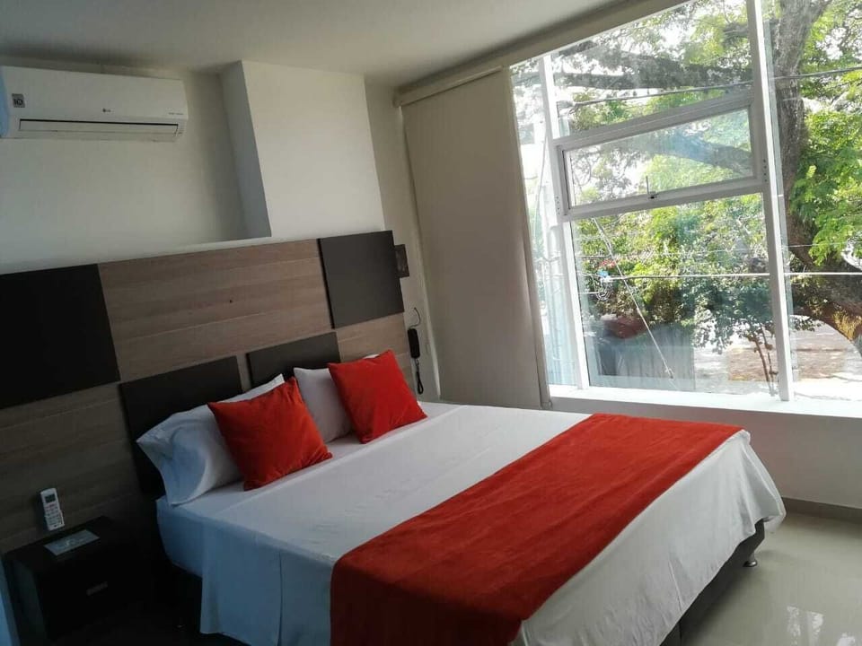 Basic Double Room, 1 Queen Bed, Non Smoking | Iron/ironing board, free WiFi, bed sheets