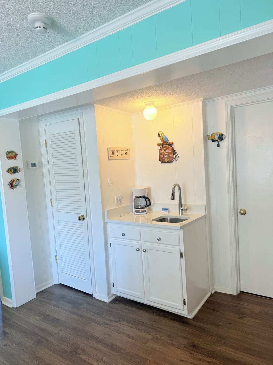 Pour yourself a cup of coffee or a cocktail at our new quartz wet bar.