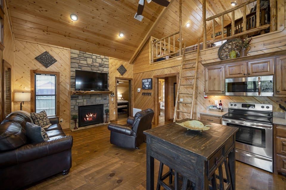 The large smart TV located over the seasonal gas fireplace!