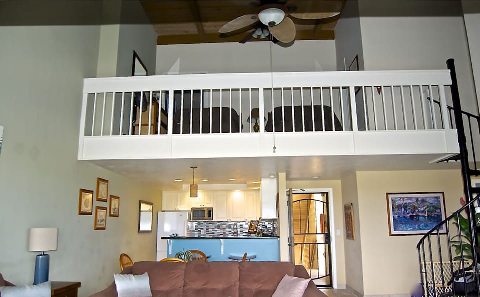 Interior view of living room, Kitchen, dining area, and loft