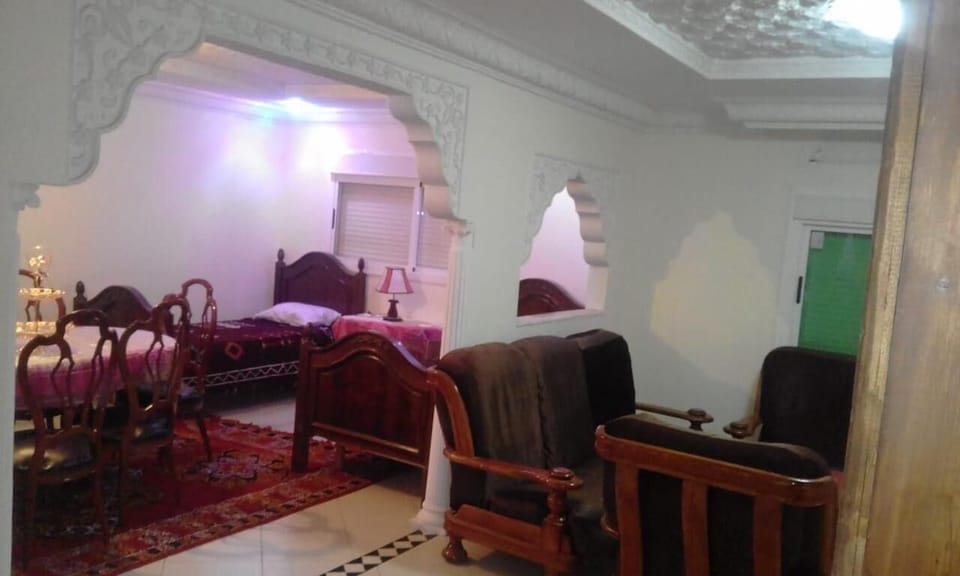Executive Apartment | Living area | 60-cm flat-screen TV with satellite channels