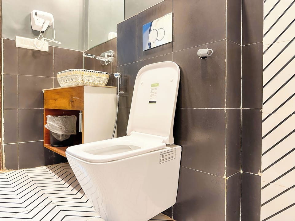 Superior AC Room With King bed | Bathroom | Shower, hydromassage showerhead, slippers, toilet paper