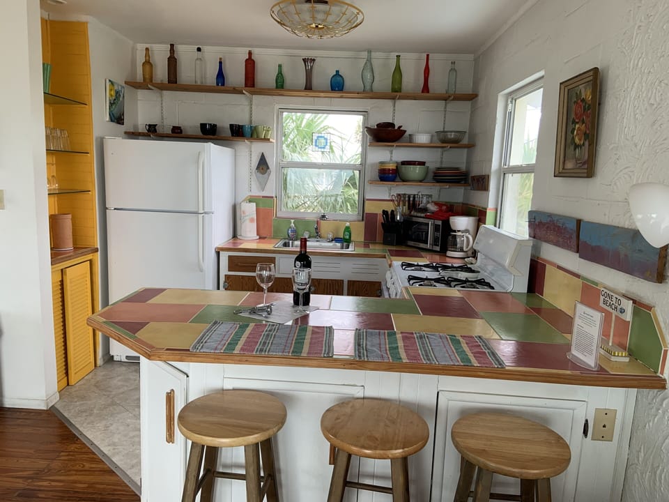 Closer look of the kitchen and kitchen counter. 