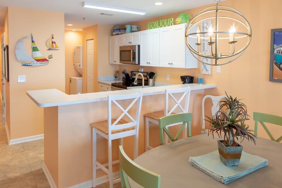 Kitchen with all brand new stainless steel appliances and corian countertops!
