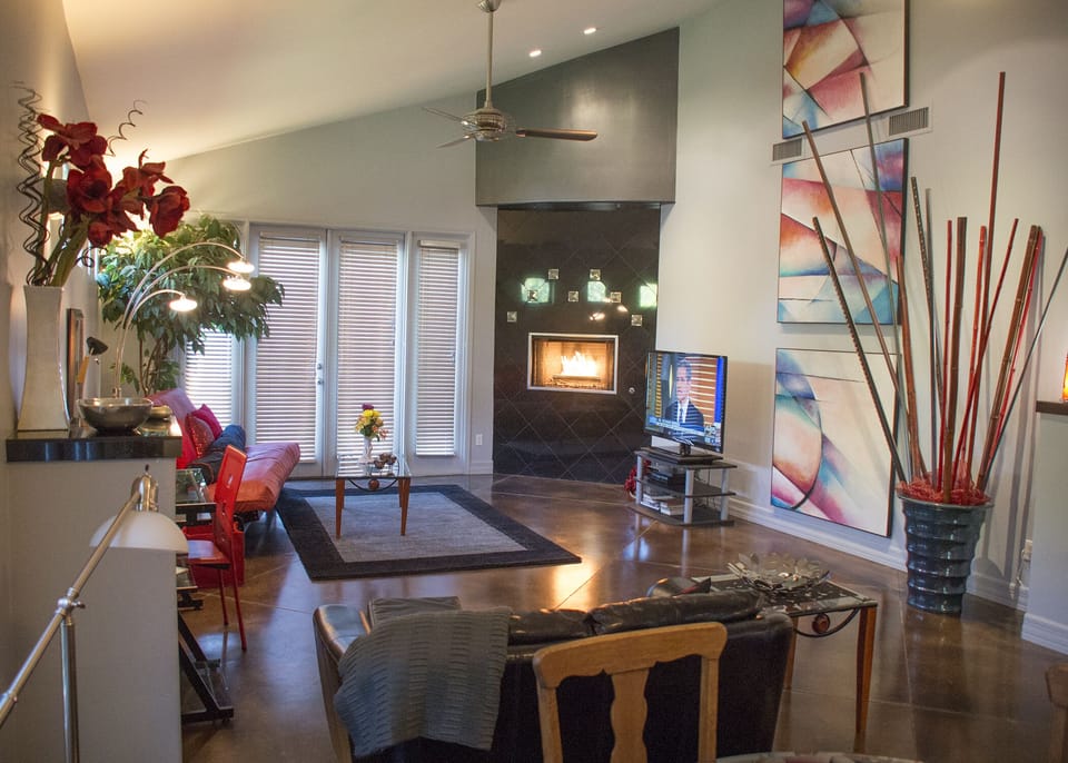 Easy, open floor plan, with cool concrete floors and original art