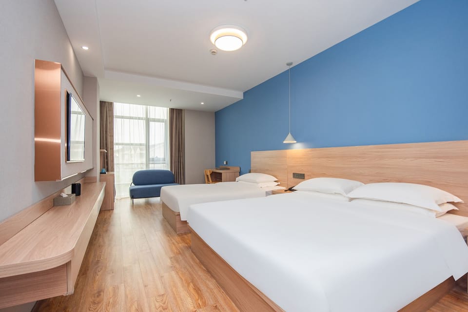 Deluxe Family Room with 3 Breakfast | Minibar, in-room safe, desk, blackout drapes