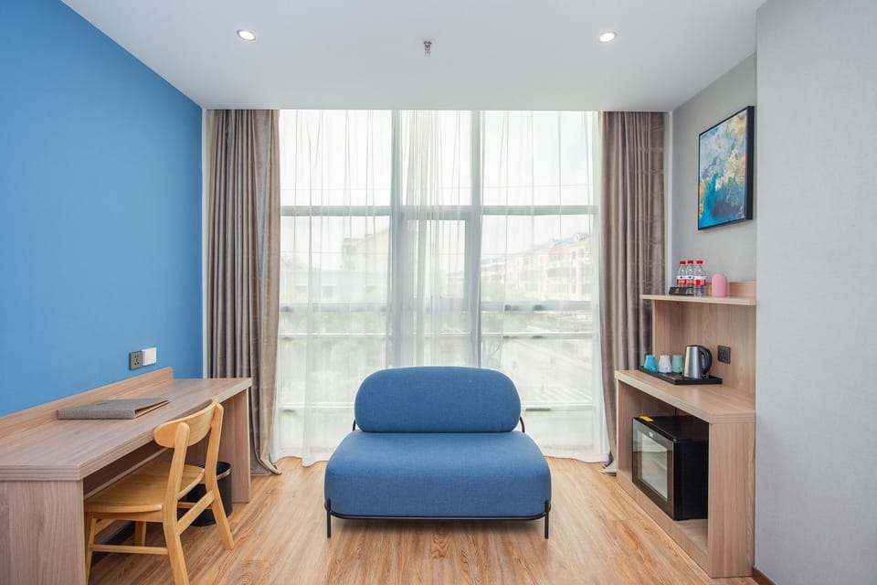 Deluxe Family Room with 3 Breakfast | Minibar, in-room safe, desk, blackout drapes