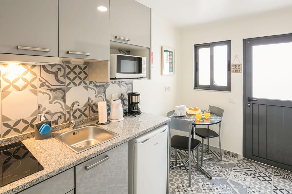 Apartment, 1 Bedroom | Private kitchen | Fridge, microwave, stovetop, coffee/tea maker