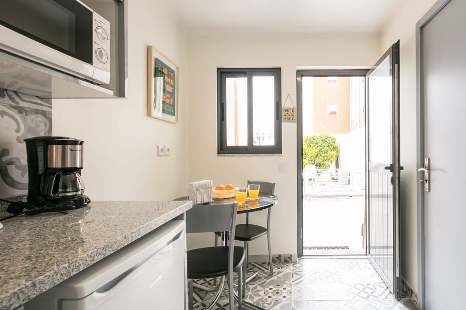 Apartment, 1 Bedroom | Private kitchen | Fridge, microwave, stovetop, coffee/tea maker