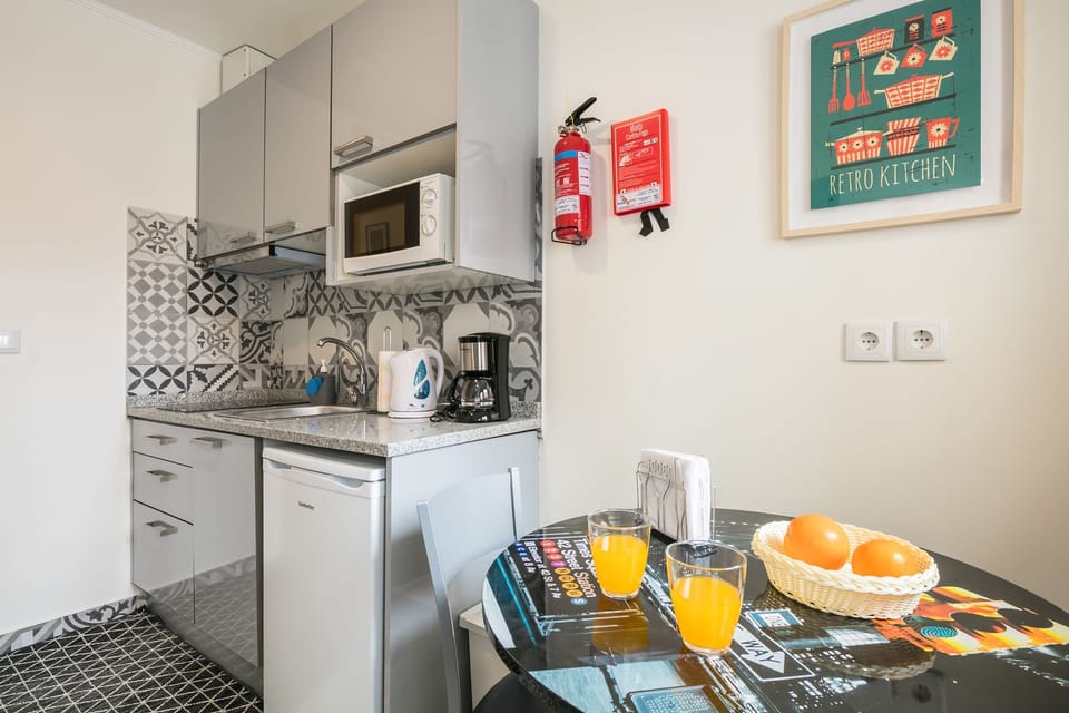 Apartment, 1 Bedroom | Private kitchen | Fridge, microwave, stovetop, coffee/tea maker