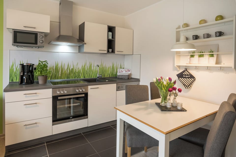 Comfort Apartment, 1 Bedroom, Non Smoking, Mountain View | Private kitchen | Microwave, electric kettle, highchair, cleaning supplies