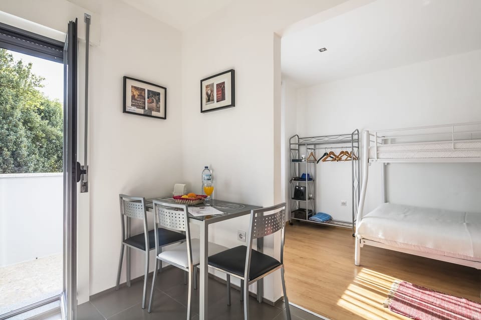 Apartment, 1 Bedroom, Balcony | 1 bedroom, iron/ironing board, free WiFi, bed sheets