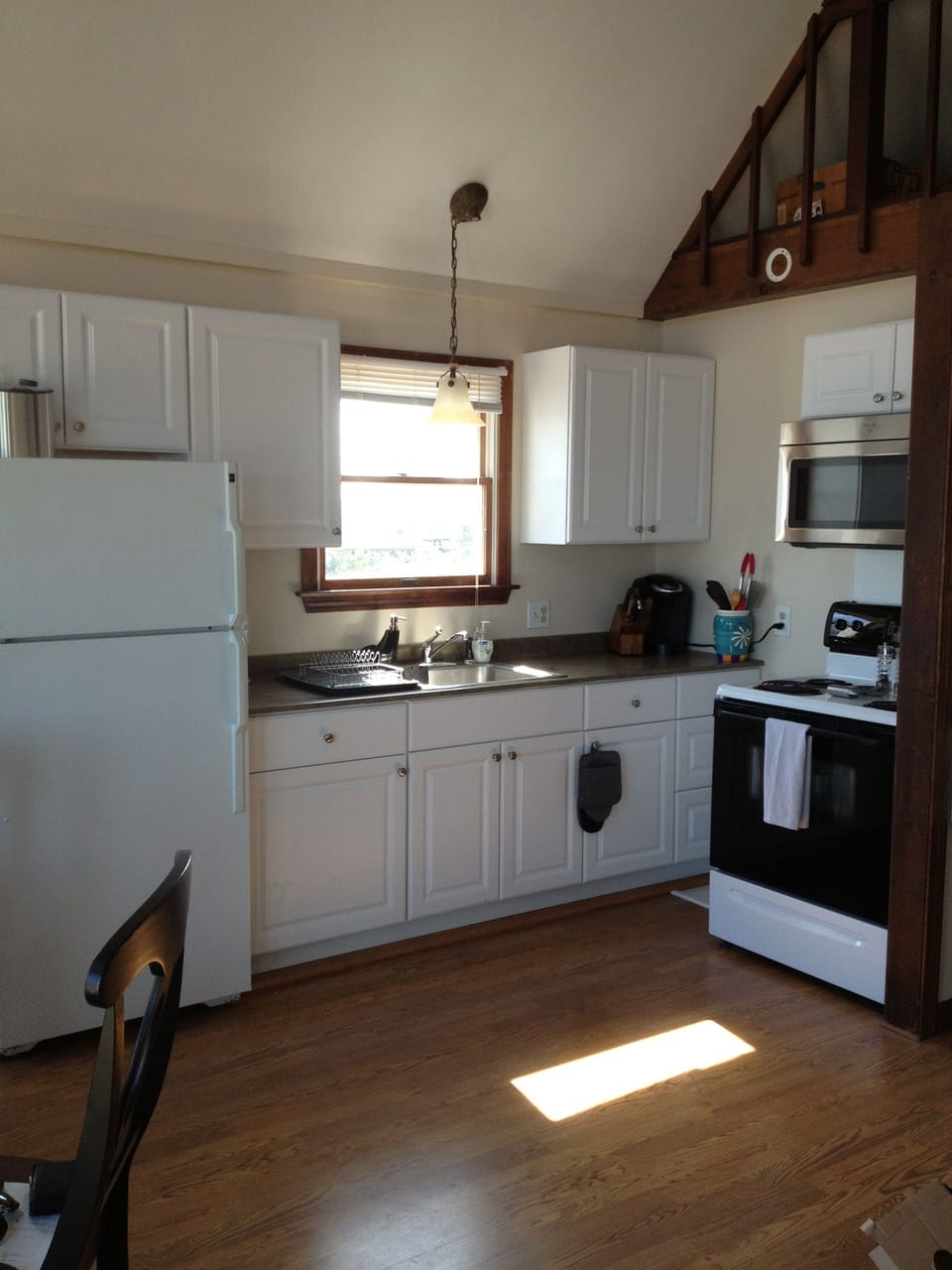 Wider view of open-plan kitchen