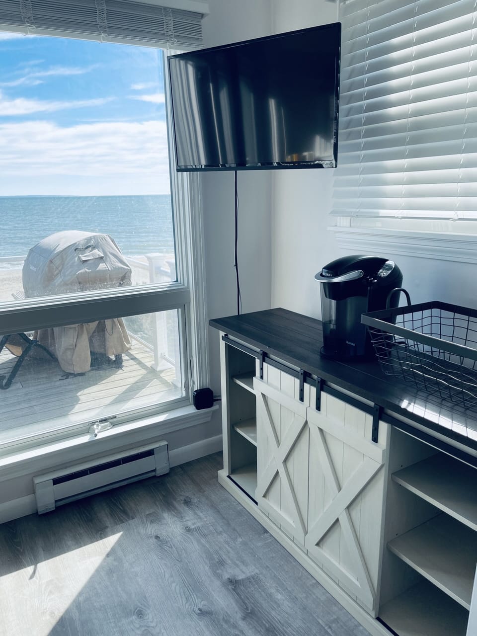 Television and sideboard with coffee machine