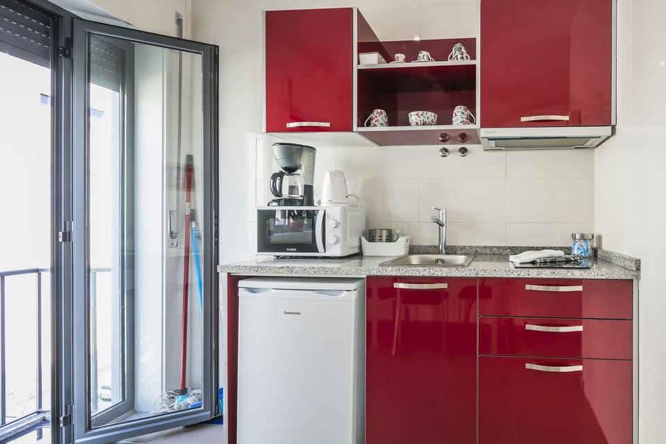 Apartment, 1 Bedroom | Private kitchen | Fridge, microwave, stovetop, coffee/tea maker