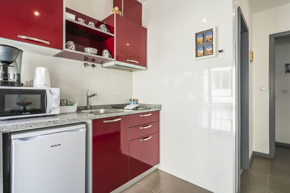 Apartment, 1 Bedroom | Private kitchen | Fridge, microwave, stovetop, coffee/tea maker