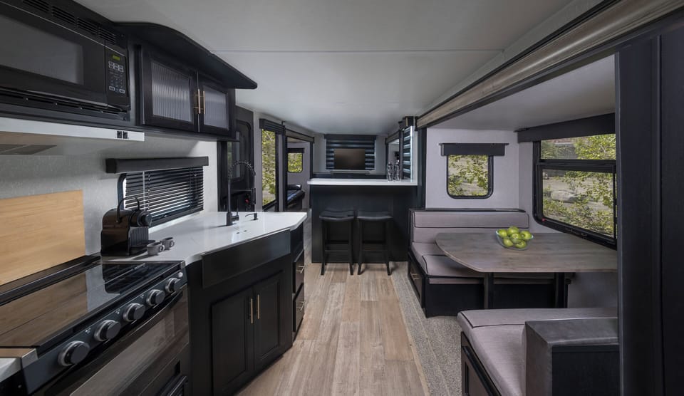 Elite Campers for Couples with Mountain Backdrop and Access to Adventure Activities | Minibar, blackout drapes, iron/ironing board, free WiFi