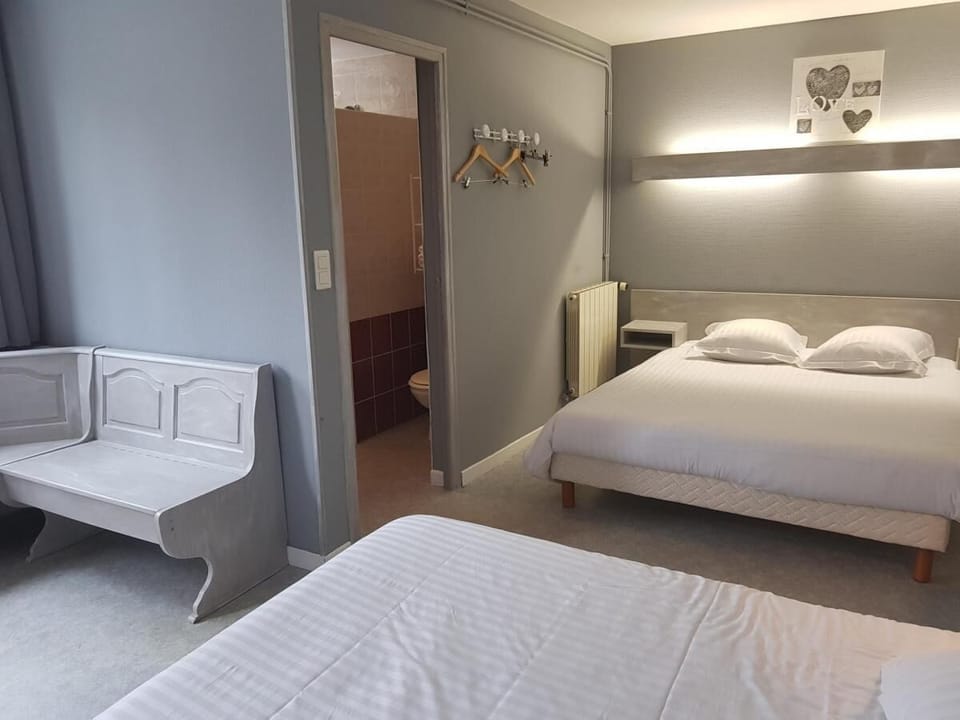 Family Room, 2 Queen Beds, Ground Floor | Individually decorated, individually furnished, desk, blackout drapes