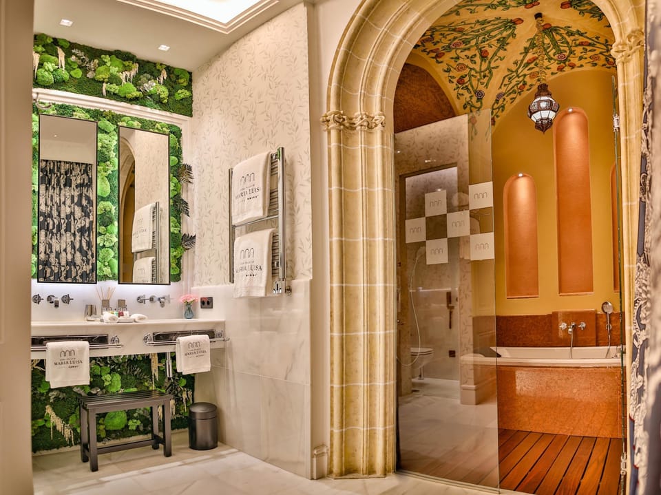 Suite, 1 King Bed (Maria Luisa) | Bathroom | Separate tub and shower, rainfall showerhead, free toiletries