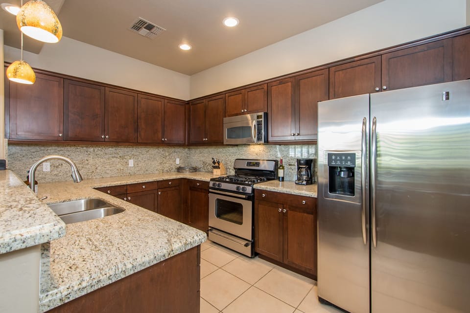Granite & Stainless Steel kitchen - open to the living & dining room!