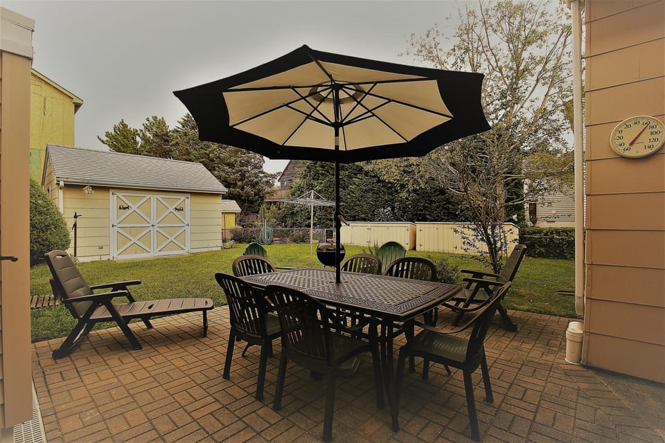 outside patio 
is accessible from den.
