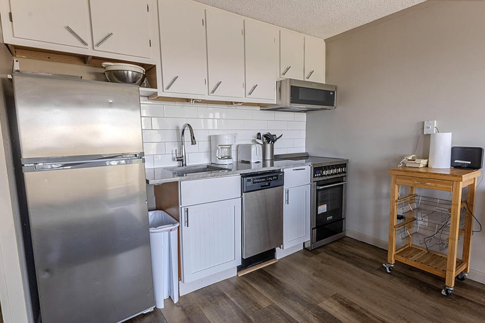 The fully equipped kitchen is the perfect place to make a snack, gourmet meal, or anything in between.  There is a Keurig coffee maker in the kitchen.