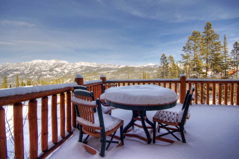Plenty of outdoor seating on wrap around deck off of living/dining room.