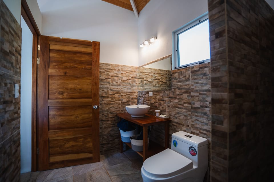 Panoramic Bungalow, 1 King Bed, Non Smoking | Bathroom | Shower, rainfall showerhead, free toiletries, hair dryer