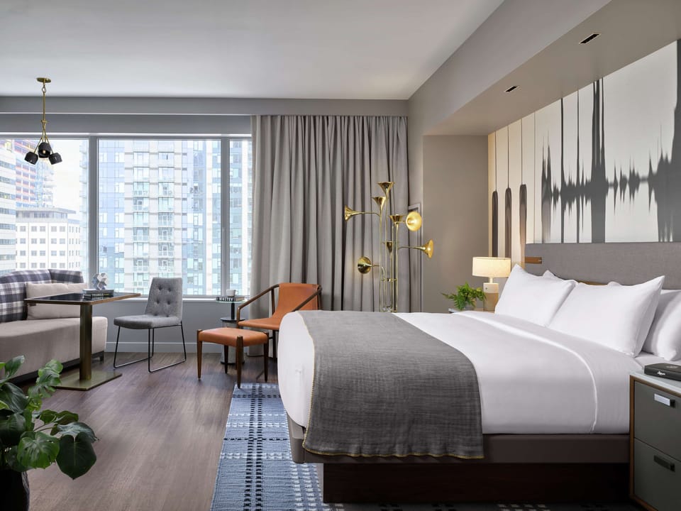 Premium bedding, down comforters, in-room safe, desk