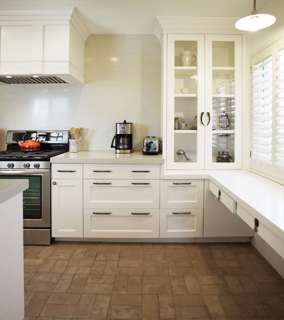 Kitchen w/ Desk Area, leading to backyard.