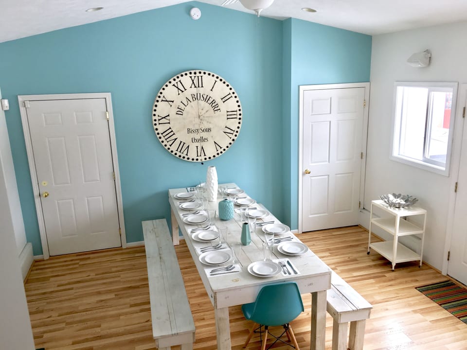 DINING ROOM:seats 12, opens to backyard &  screened in porch. Door to loft shown
