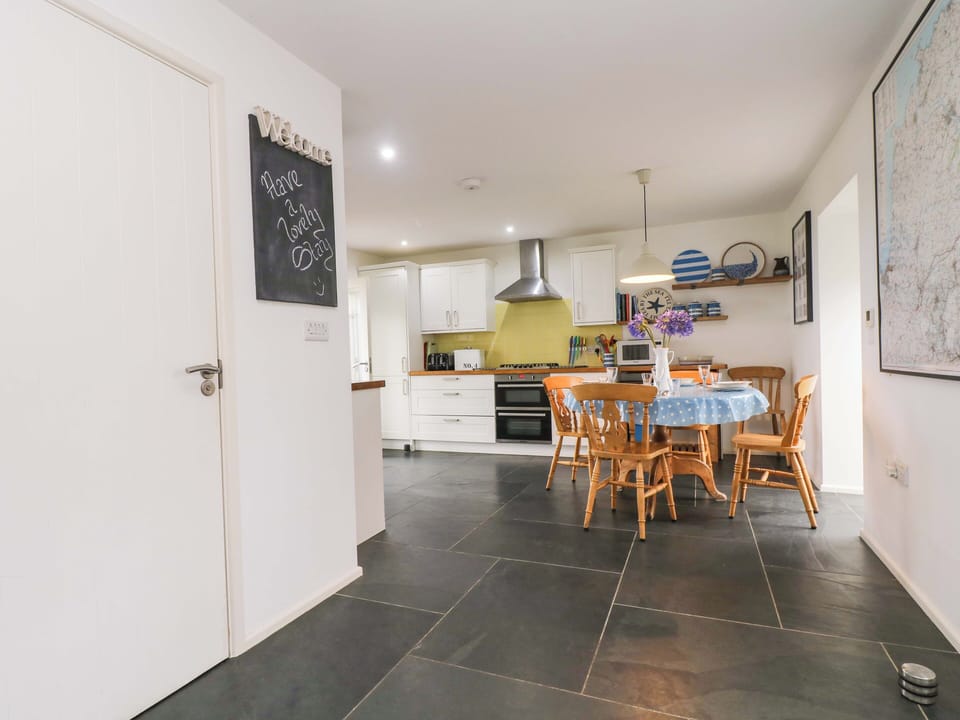 Cottage | Private kitchen | Fridge, dishwasher, highchair, cookware/dishes/utensils