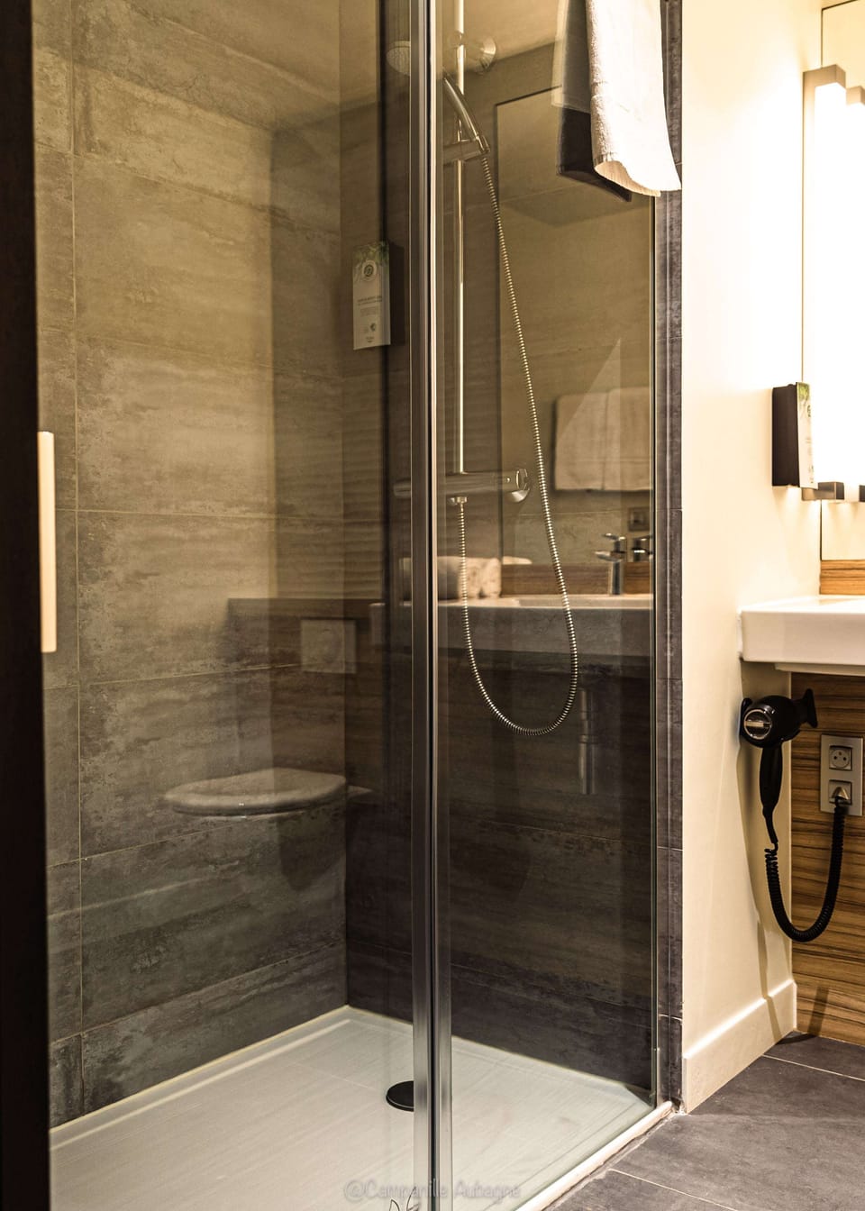 Shower, eco-friendly toiletries, hair dryer, towels