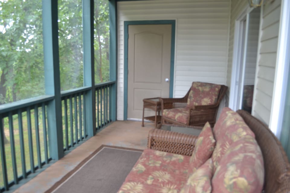 Enjoy being high on a bluff. Look down between the trees at Lake Taneycomo!